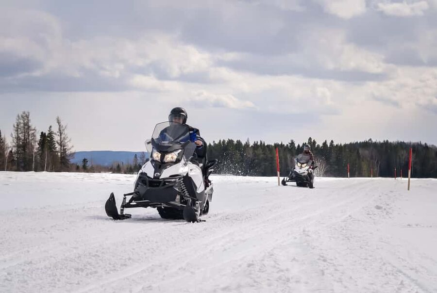 15 min. Tadoussac: Snowmobile Expedition in Saguenay Fjord - Riding toward the Saguenay Fjord