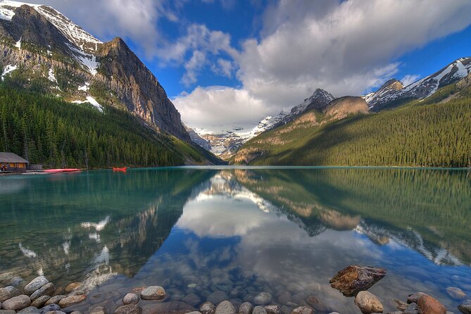 8 Iconic Stops. 12 Comfy Seats. See Banff's Best in First Class. - Lake Louise begins the day with the big view