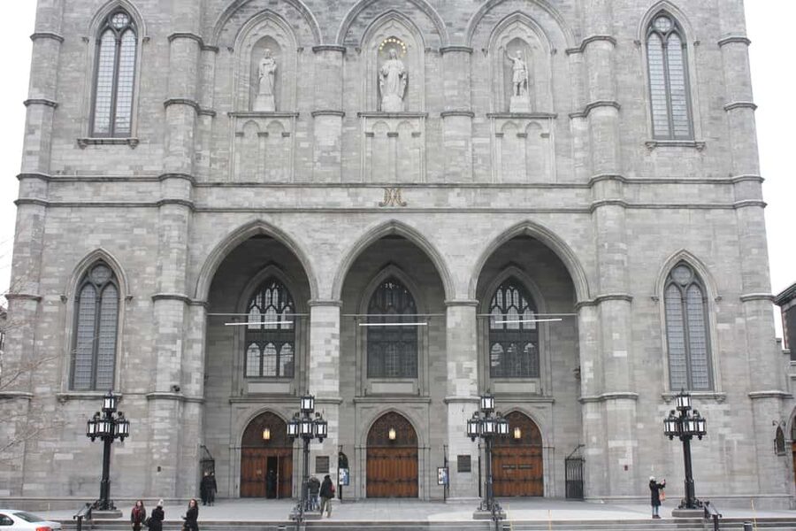 A Walking Tour of Old Montreal - Cobblestone streets with everyday Montreal in view