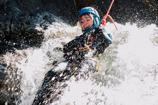 Adrenaline Canyoning Tour - Getting dressed for cold water and rough rock