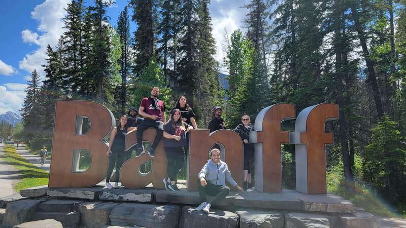 Airport Pickup & Private Tour from Calgary to The Rockies! - Two Jack Lake gives you the postcard moment