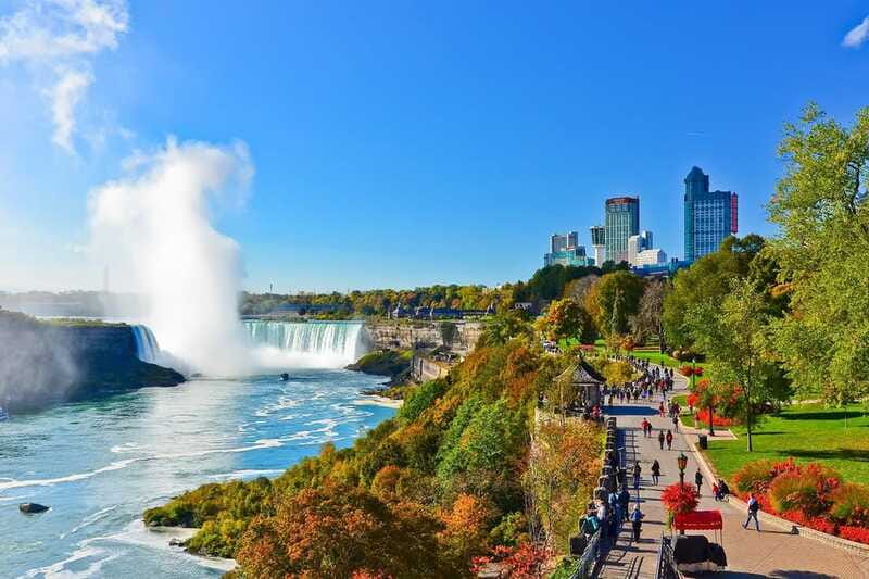 All inclusive Niagara Sightseeing Tour From Niagara Falls - Taking the Niagara City Cruises boat