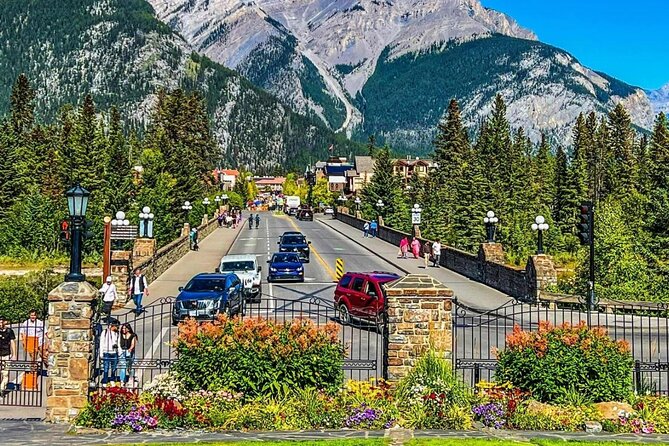 Banff: Gondola, Hot Spring and Three Lakes Tour - Surprise Corner and Bow Falls bring the classic Banff views