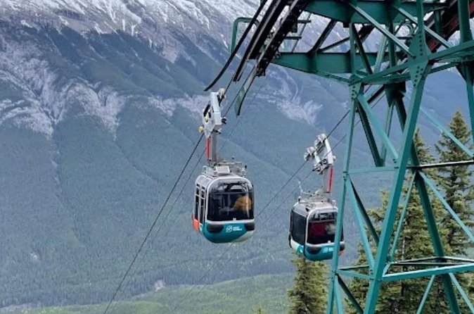 Banff Gondola Hot Springs Bow Falls and Three Lakes tour - Bow Falls, A Short Stop With Easy Views