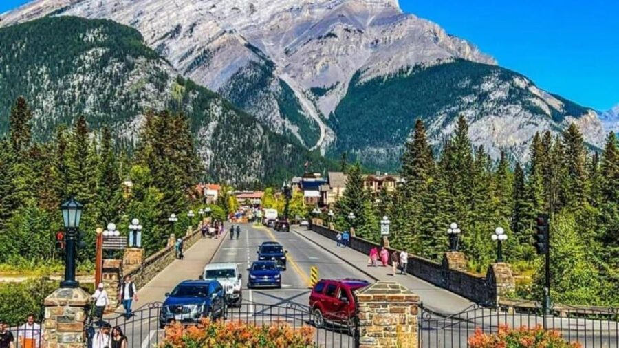 Banff: Gondola, Hot Springs, Bow falls & Three lakes tour - Bow Falls and Surprise Corner finish with classic Banff views
