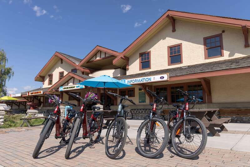 Banff: Mountain Lakeside Guided E-Bike Tour - Lake Minnewanka and the town beneath the water