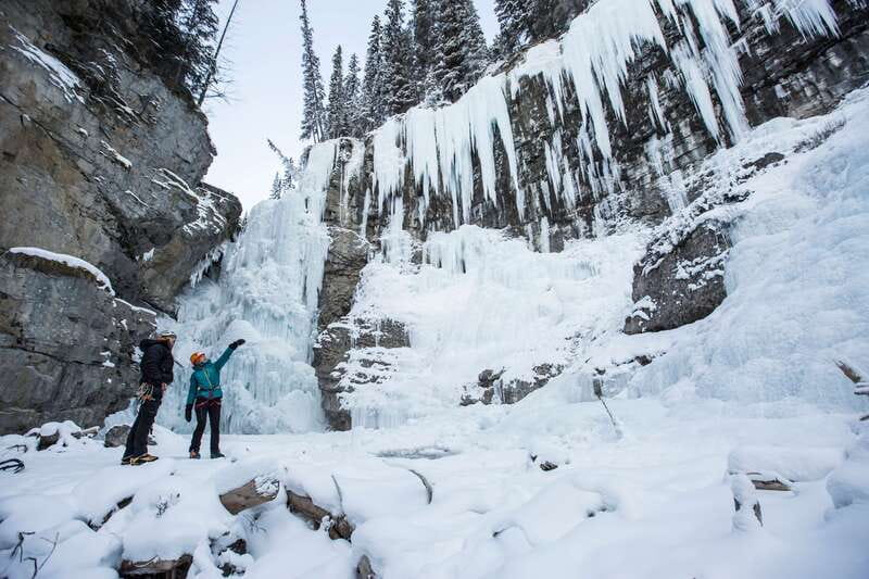 Banff: Premium Johnston Canyon Frozen Falls Guided Adventure - Reaching Lower Falls with cleats and poles
