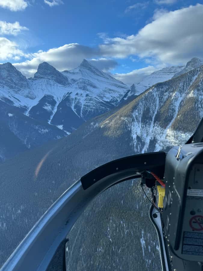 Canmore: 25-Minute Three Sisters Helicopter Tour - Following the Goat and Sundance ranges toward Banff