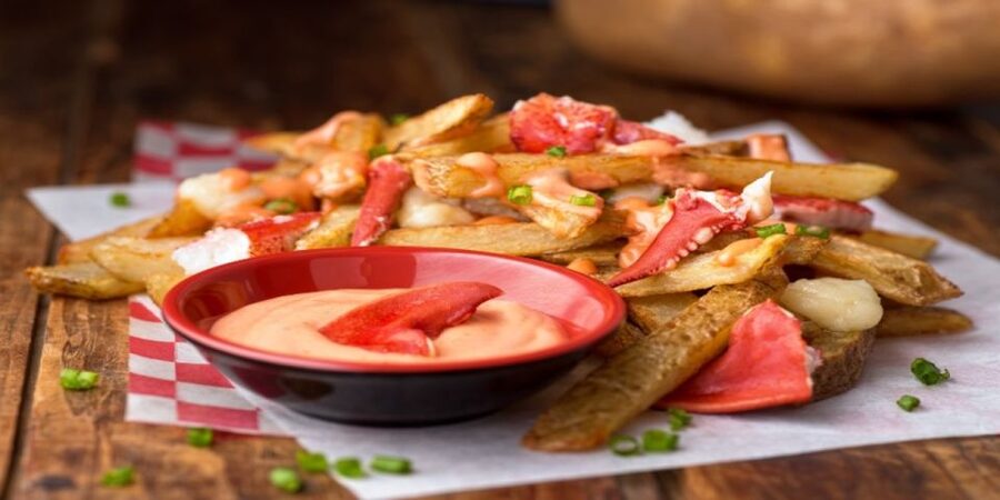 Charlottetown: Small Group Food Walking Tour - Lobster poutine, with a menu change to watch