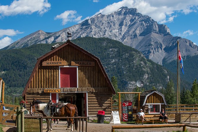 Covered Wagon Ride in Banff with Western Cookout - A covered wagon beside the Bow River