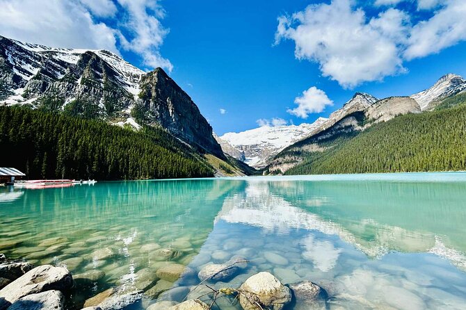 From Banff: Moraine Lake and Lake Louise Half Day Tour - Lake Louise: turquoise water and a short lakeshore walk