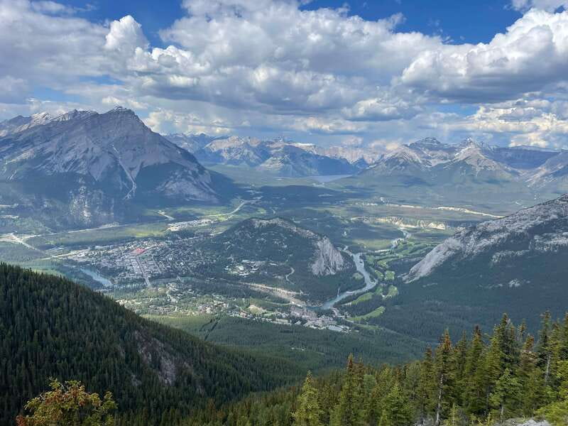 From Calgary: Banff, Moraine Lake and Lake Louise Tour - Bow Falls adds movement to the scenery