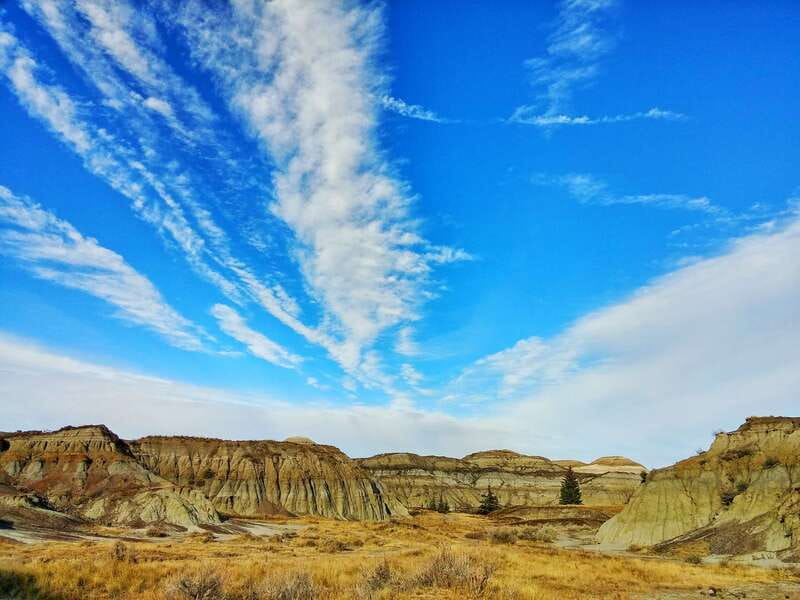 From Calgary: Canadian Badlands Private Geological Tour - Drumheller adds a quick town stop
