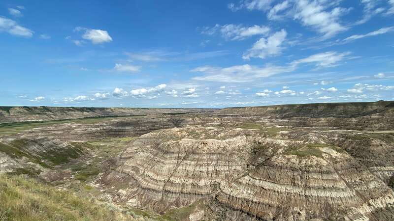 From Calgary: Canadian Badlands Private Geological Tour - Atlas Coal Mine shows the cost of the Badlands