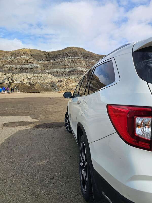 From Calgary: Drumheller Private Tour, Full day sightseeing - The Drumheller sign and the Starmine bridge