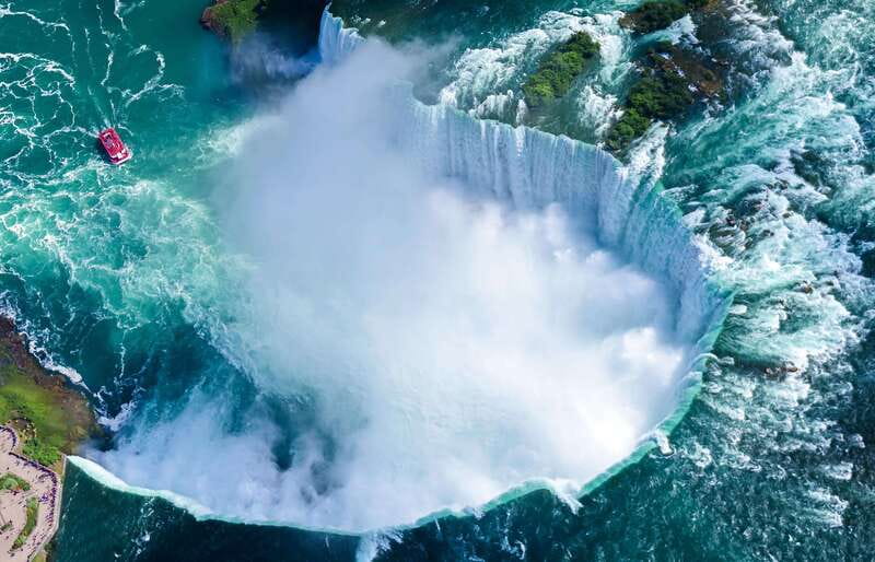 From Montreal: Toronto, Niagara Falls & 1000 Islands Tour - Niagara Falls by boat, flight, and nighttime light