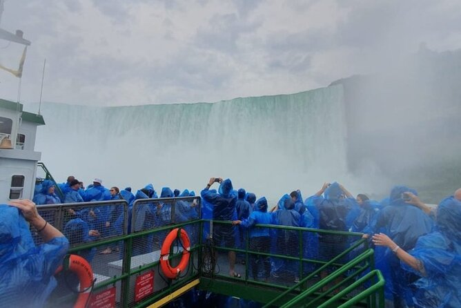 From Toronto: Niagara Falls Day Tour with Optional Boat Cruise - Clifton Hill, Skylon Tower, and Journey Behind the Falls