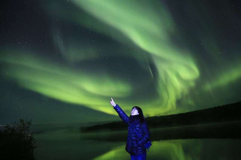 From Yellowknife: Northern Lights Bus Tour with Photos - Three stops, changing conditions, and the search itself