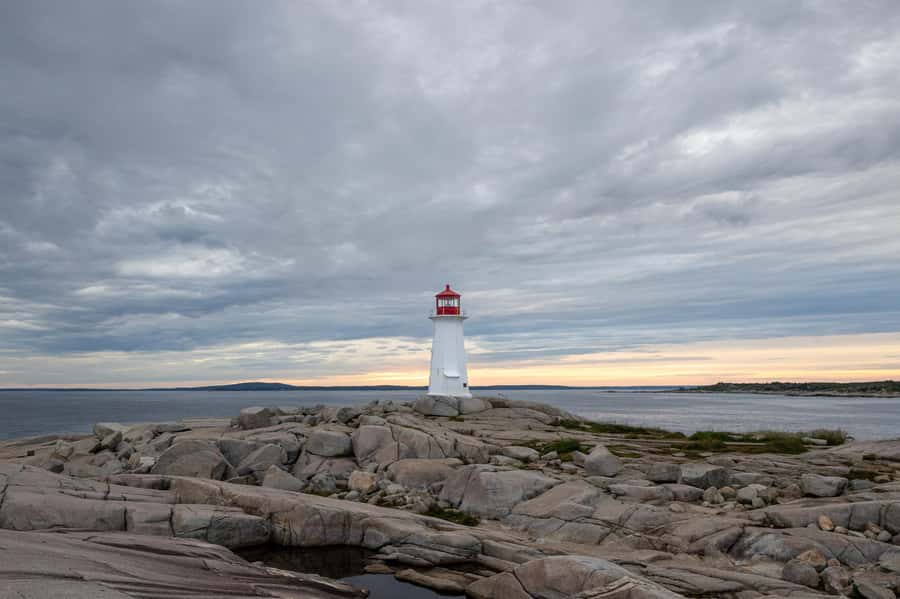 Halifax Small-Group Express Peggy’s Cove Tour - Leaving downtown Halifax in a small van