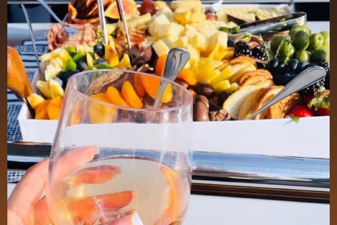 JFarwell Sunset Wine and Cheese Yacht Sailing - The crew shapes the evening