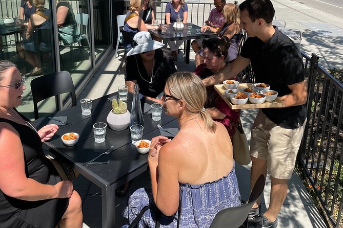 Kelowna: #1 Rated Walking Food Tour with 7 Tastings and 4 Drinks - Curious Cafe serves pizza from Naples
