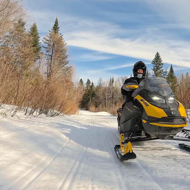 Laurentians: Snowmobile Guided Tour - Valleys, Peaks, and Snowy Trail Stops