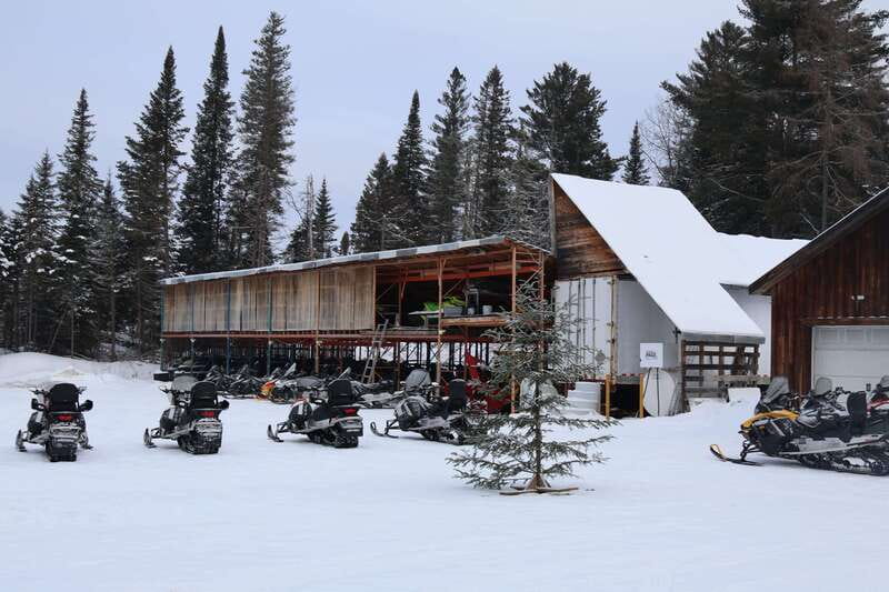 Montreal: Canadian Forest Guided Tour by Snowmobile - Getting suited up in Saint-Hippolyte