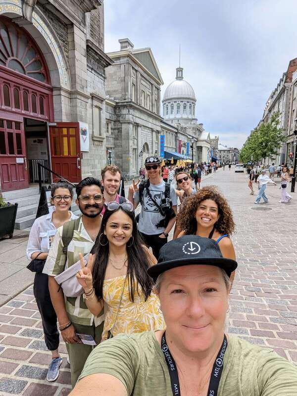 Montreal: Top Rated Small Group Old Montreal Walking Tour - Saint-Paul Street and the city beneath the postcard