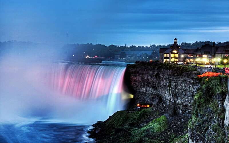 Niagara Falls: Day & Night Tour with Boat Ride and Dinner - Journey Behind the Falls: sound, spray, and close quarters