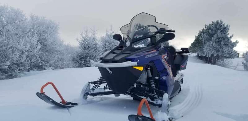 Quebec City: Guided Snowmobile Tour - From wooded trails to open snowy straights