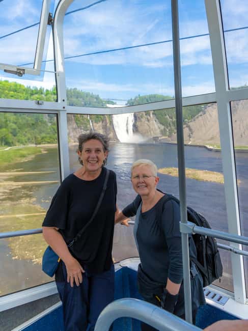 Quebec City: Montmorency Falls and Microbrewery eBike Tour - Feeling the spray at Montmorency Falls