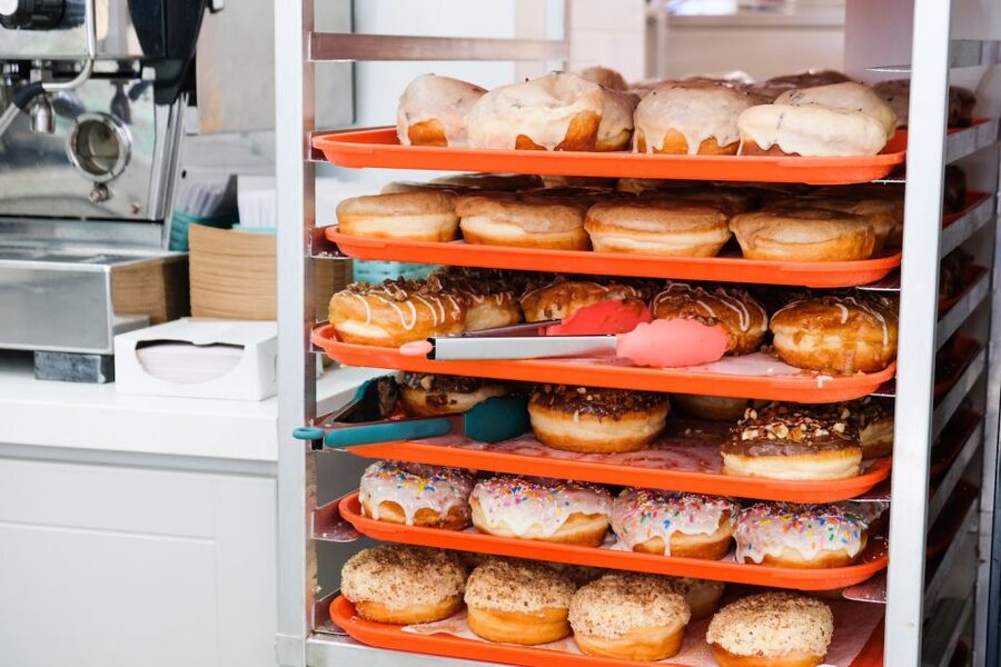 Toronto: Guided Donut Walking Tour with Tastings and Coffee - The guides and the human side of the tour