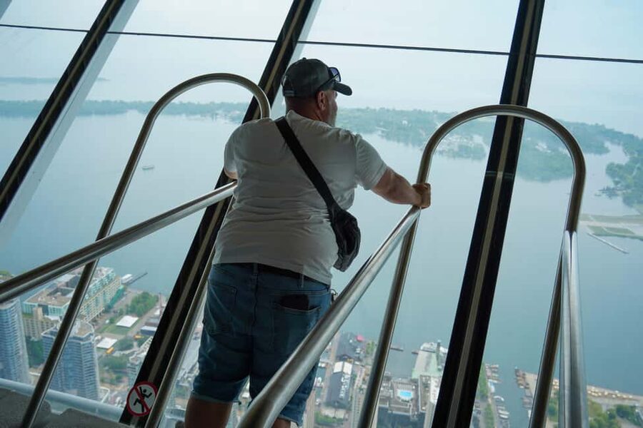 Toronto: Premium Driving Tour with Tower and Harbour Cruise - Why the guide matters more than the vehicle