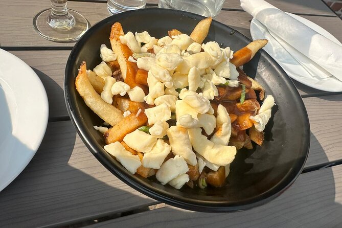 Toronto: St Lawrence Market Food Tour with 6 Food Tastings - Poutine, butter tarts, and the Canadian dessert course