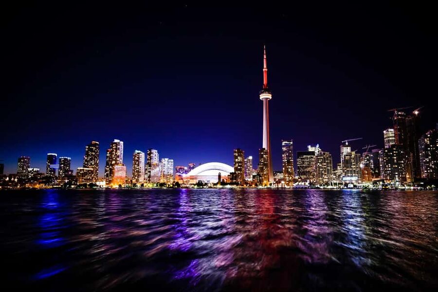 Toronto: True Tales of Toronto Harbour Audio Boat Tour - Toronto’s skyline from the harbour after dark